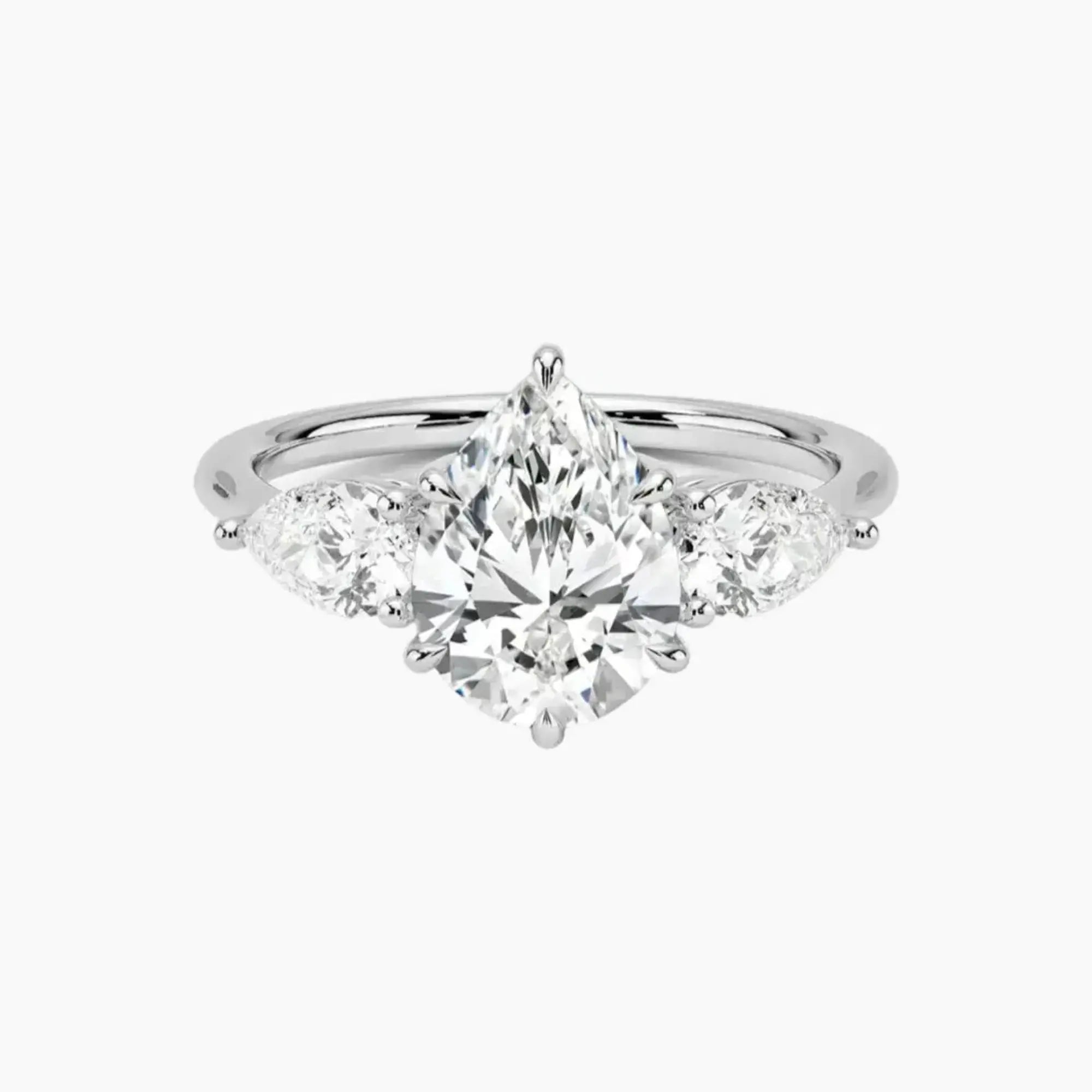 Calliope Pear Three Stone 3 Carat Lab Grown Diamond Engagement Ring in 14K Yellow Gold